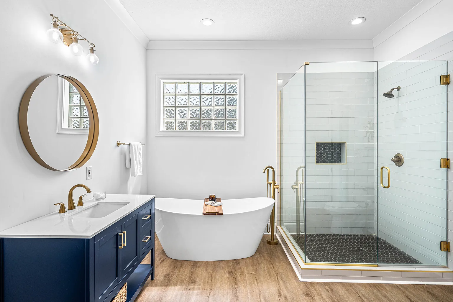 Bathroom with freestanding tub and glass shower